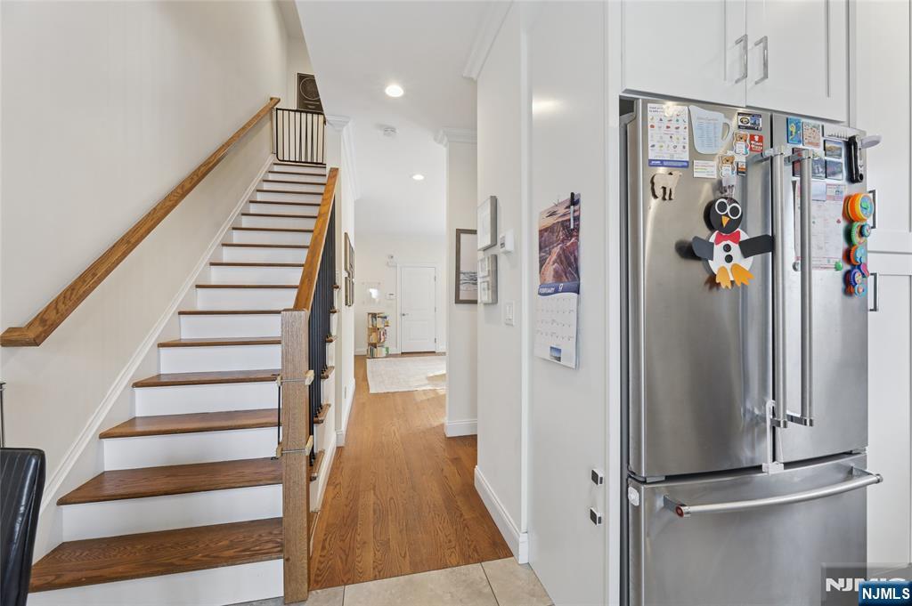 45-47 Franklin Street Tenafly, NJ 07670 - Photo 15 of 41 a view of entryway with stairs and wooden floor