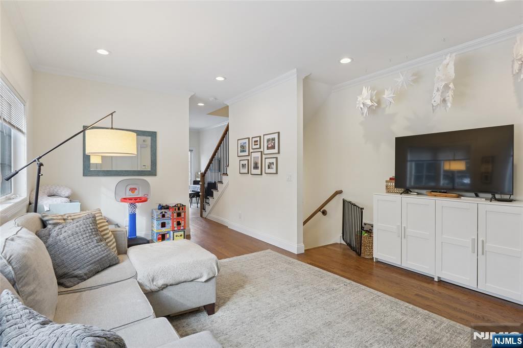 45-47 Franklin Street Tenafly, NJ 07670 - Photo 3 of 41 a living room with furniture and a flat screen tv