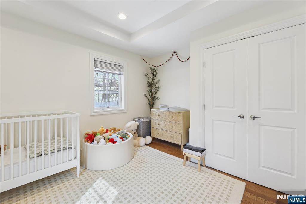 45-47 Franklin Street Tenafly, NJ 07670 - Photo 35 of 41 a living room with furniture and a window