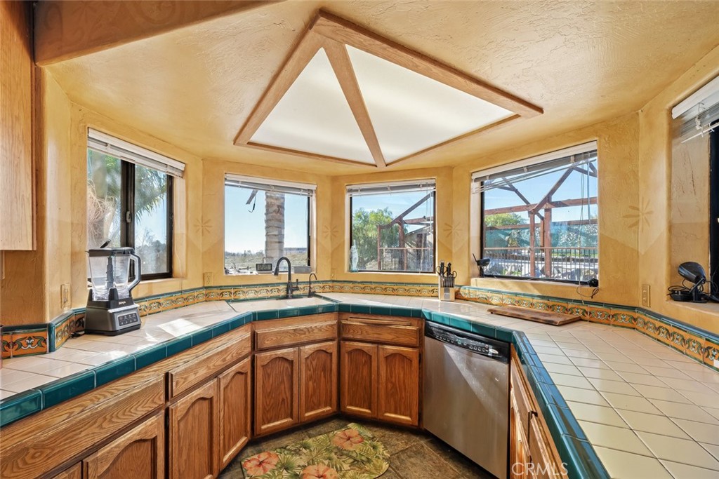 330 East Ormonde Road Arroyo Grande, CA 93420 - Photo 12 of 56 a large kitchen with a large window