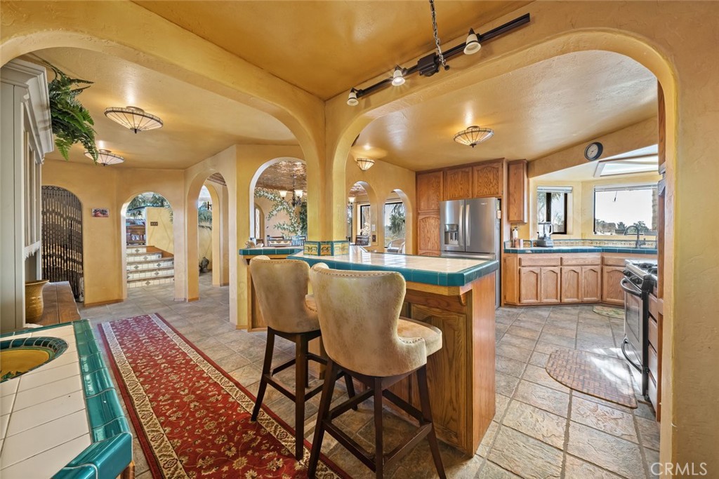 330 East Ormonde Road Arroyo Grande, CA 93420 - Photo 15 of 56 a view of a dining room with furniture and wooden floor