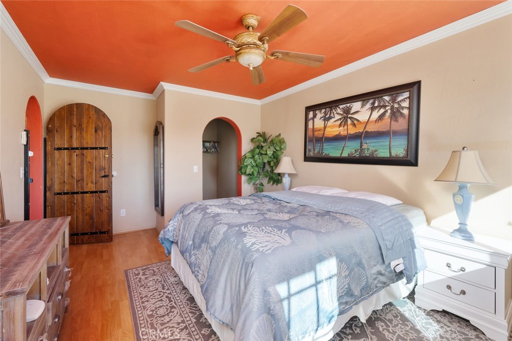 330 East Ormonde Road Arroyo Grande, CA 93420 - Photo 24 of 56 a bed room with a bed and a chandelier