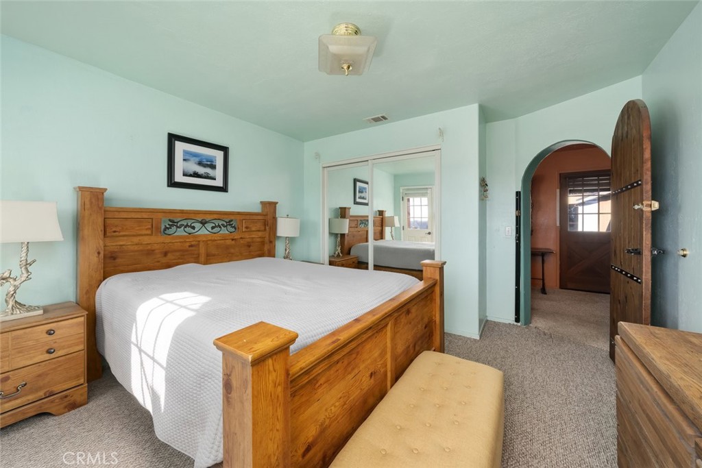 330 East Ormonde Road Arroyo Grande, CA 93420 - Photo 27 of 56 a bed room with a bed and a mirror