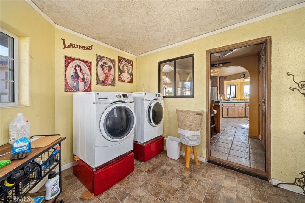 330 East Ormonde Road Arroyo Grande, CA 93420 - Photo 28 of 56 a utility room with dryer washer and a view of living room