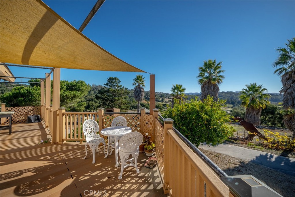 330 East Ormonde Road Arroyo Grande, CA 93420 - Photo 5 of 56 a view of a patio with table and chairs under an umbrella