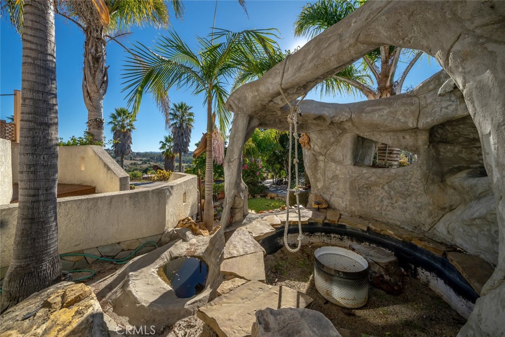 330 East Ormonde Road Arroyo Grande, CA 93420 - Photo 52 of 56 a view of a patio with couches and potted plants