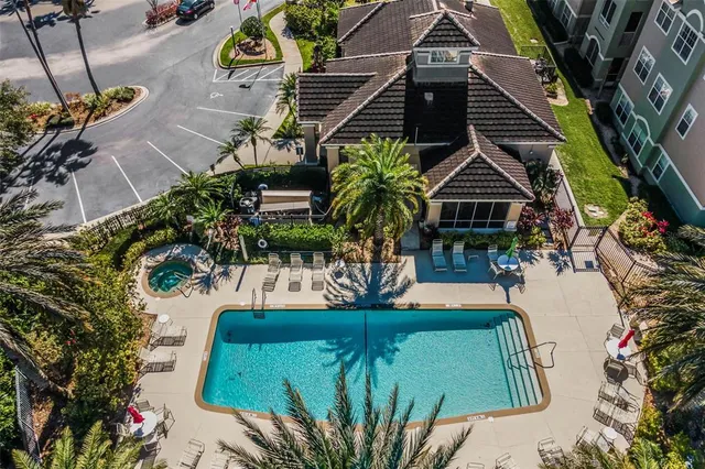 an outdoor space with seating area and trees