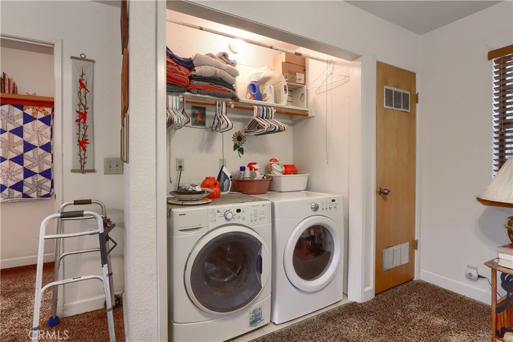 3692 Manzanita Road Mariposa, CA 95338 - Photo 24 of 71 a view of a storage & utility room with washer and dryer