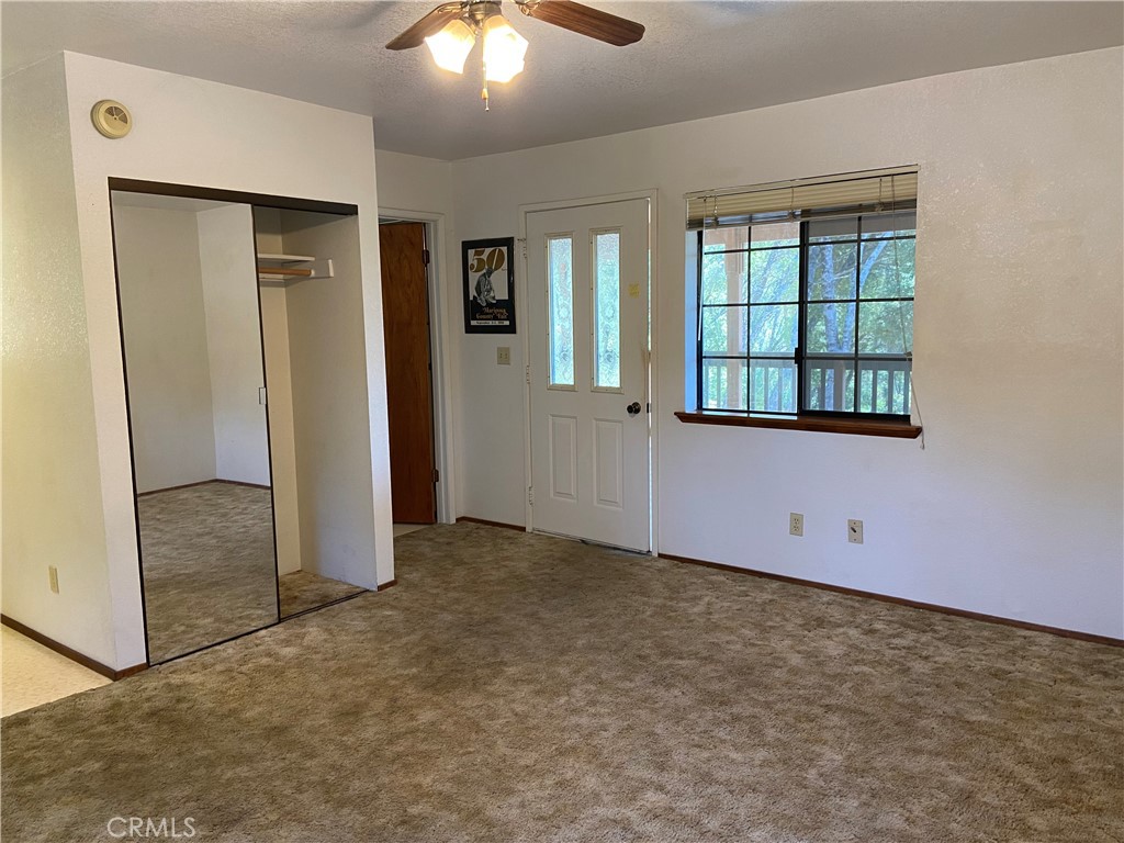 3692 Manzanita Road Mariposa, CA 95338 - Photo 47 of 71 an empty room with windows