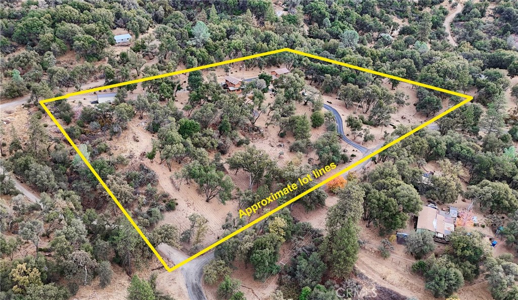 3692 Manzanita Road Mariposa, CA 95338 - Photo 69 of 71 a view of swimming pool with a small yard and large trees