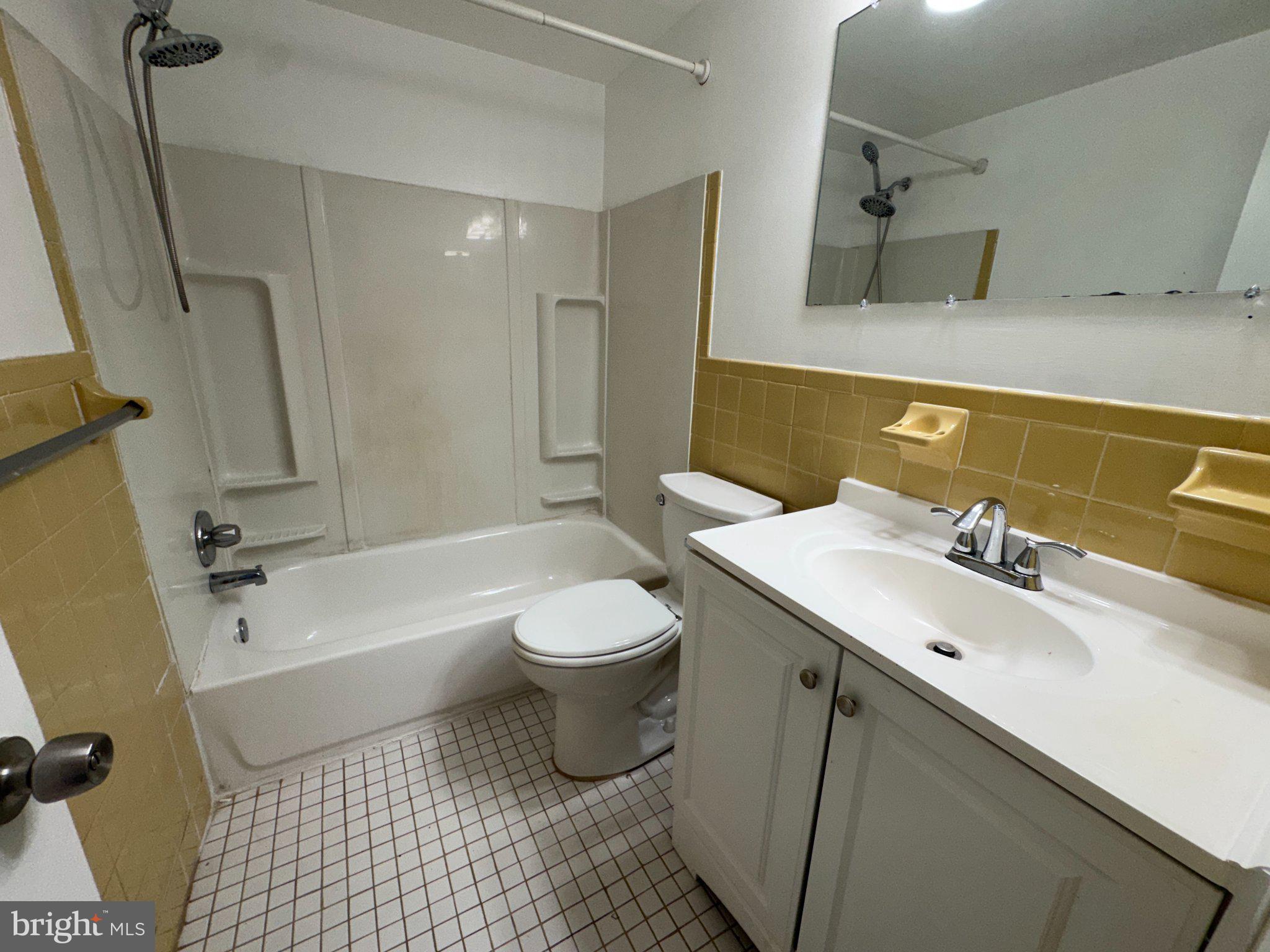 12044 Abby Road, Unit 1 Philadelphia, PA 19154 - Photo 9 of 10 a bathroom with a sink toilet and shower
