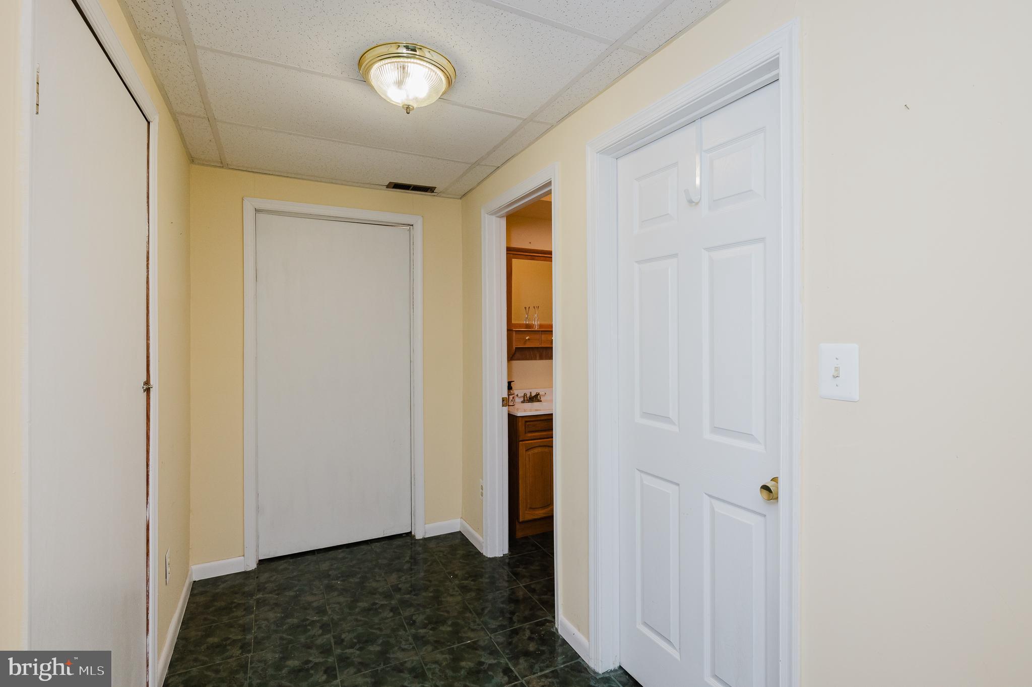 2555 Baldwin Mill Road Baldwin, MD 21013 - Photo 59 of 110 Basement Hallway with Storage