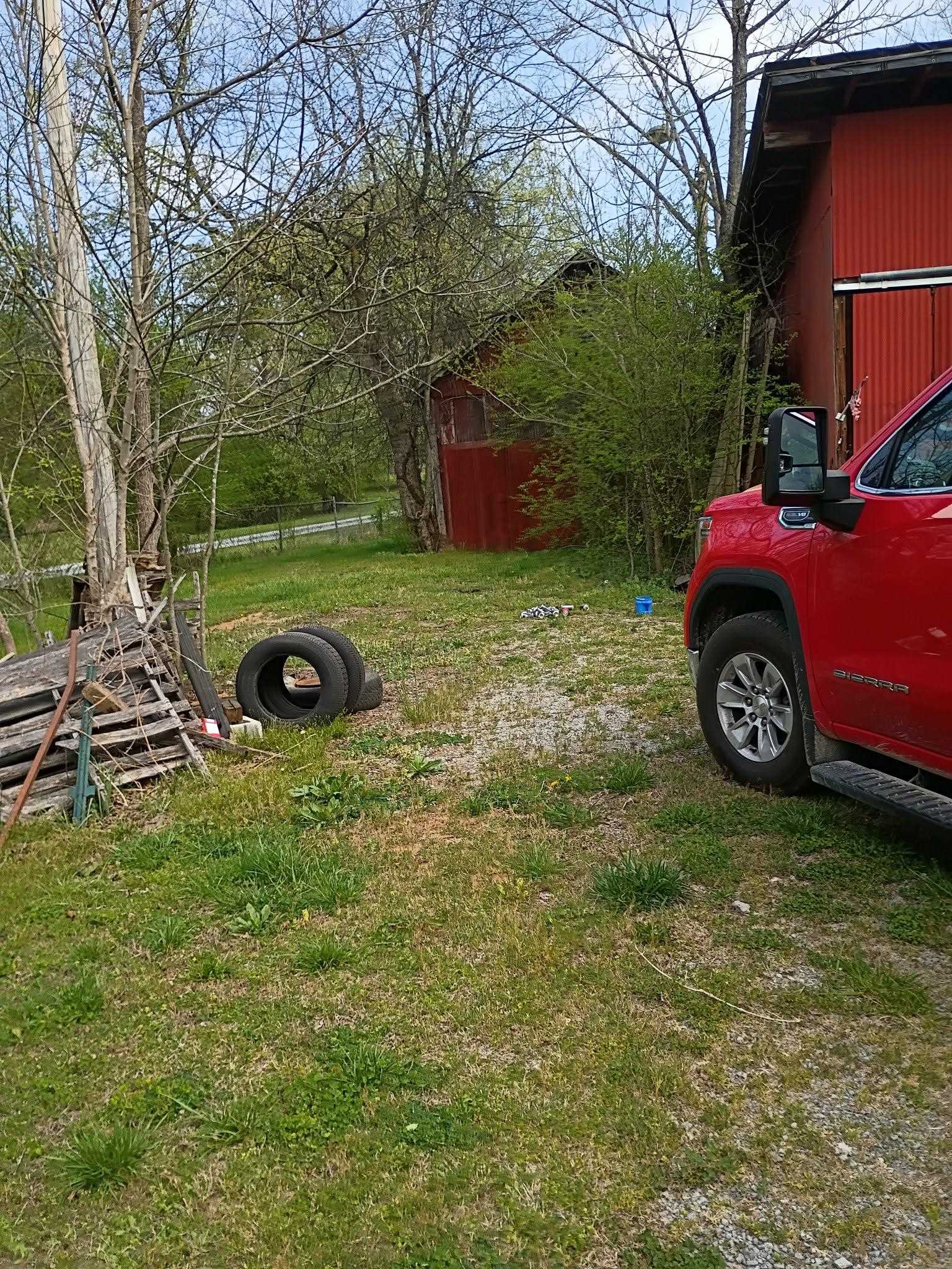 5255 Highway 30 Decatur, TN 37322 - Photo 7 of 36 View of green lawn with an outbuilding