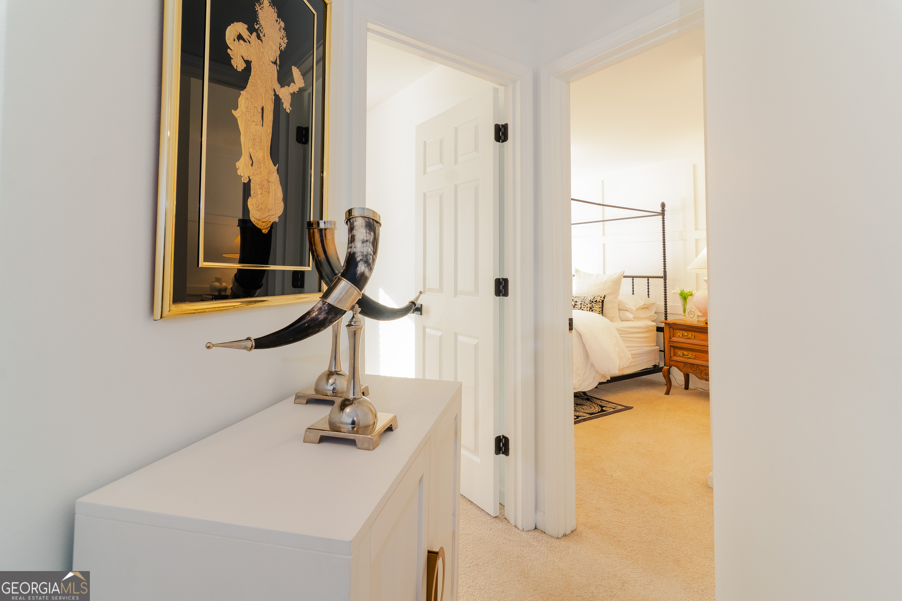 4957 Warmstone Way Southeast, Unit 15 Atlanta, GA 30339 - Photo 20 of 34 a bathroom with a sink and a mirror