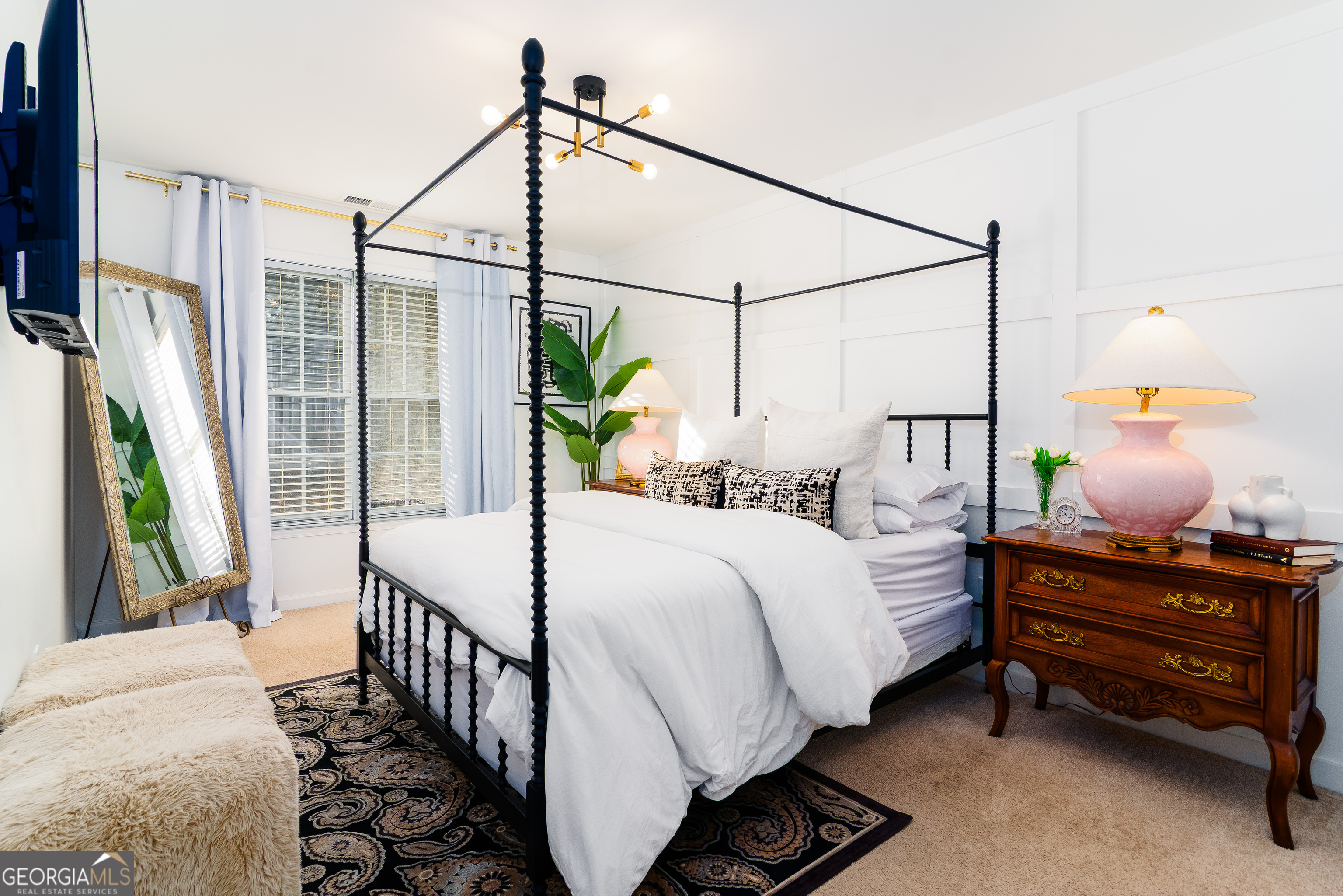 4957 Warmstone Way Southeast, Unit 15 Atlanta, GA 30339 - Photo 21 of 34 a bedroom with a bed and a window