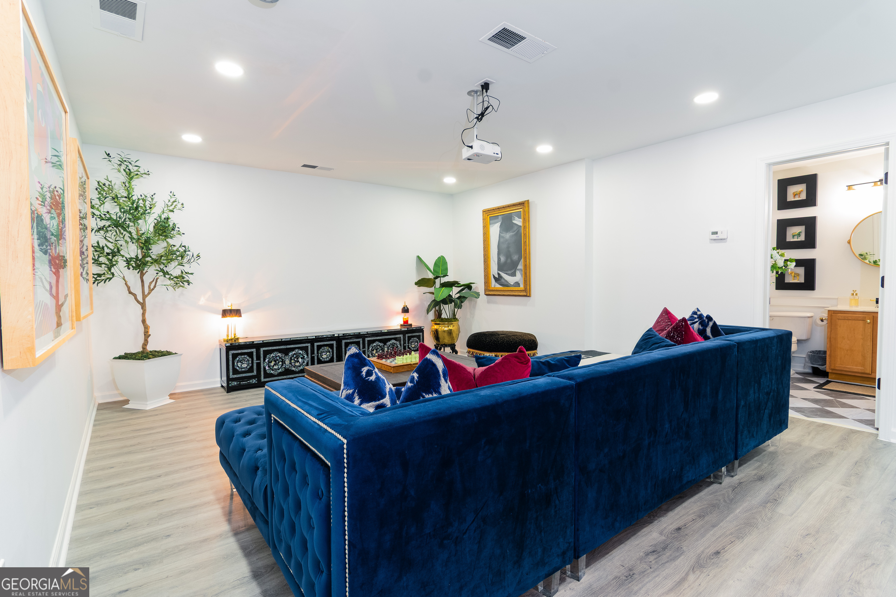 4957 Warmstone Way Southeast, Unit 15 Atlanta, GA 30339 - Photo 23 of 34 a living room with furniture and a couch