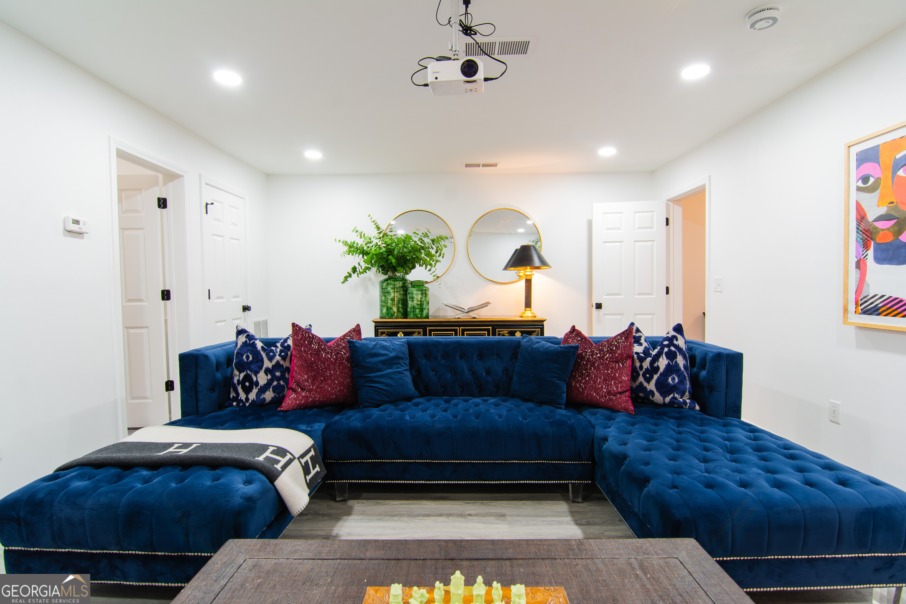 4957 Warmstone Way Southeast, Unit 15 Atlanta, GA 30339 - Photo 24 of 34 a living room with furniture and a couch