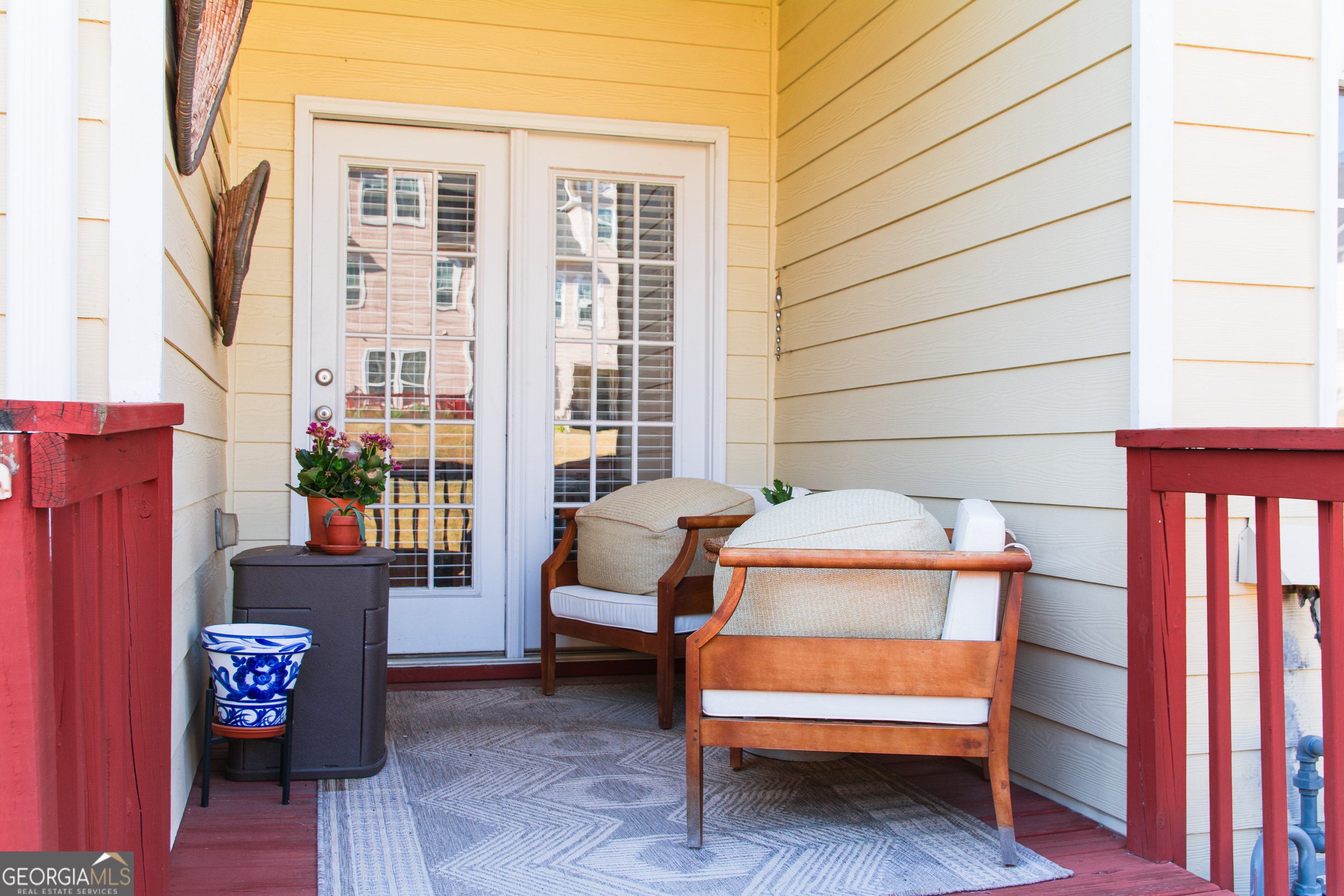 4957 Warmstone Way Southeast, Unit 15 Atlanta, GA 30339 - Photo 26 of 34 a backyard of a house with outdoor seating