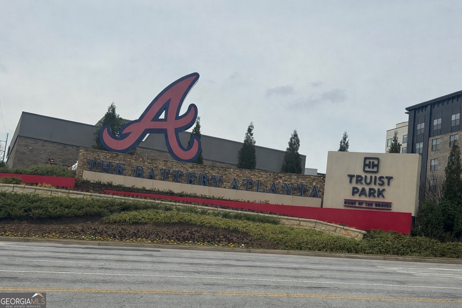 4957 Warmstone Way Southeast, Unit 15 Atlanta, GA 30339 - Photo 30 of 34 a view of road and building in the background