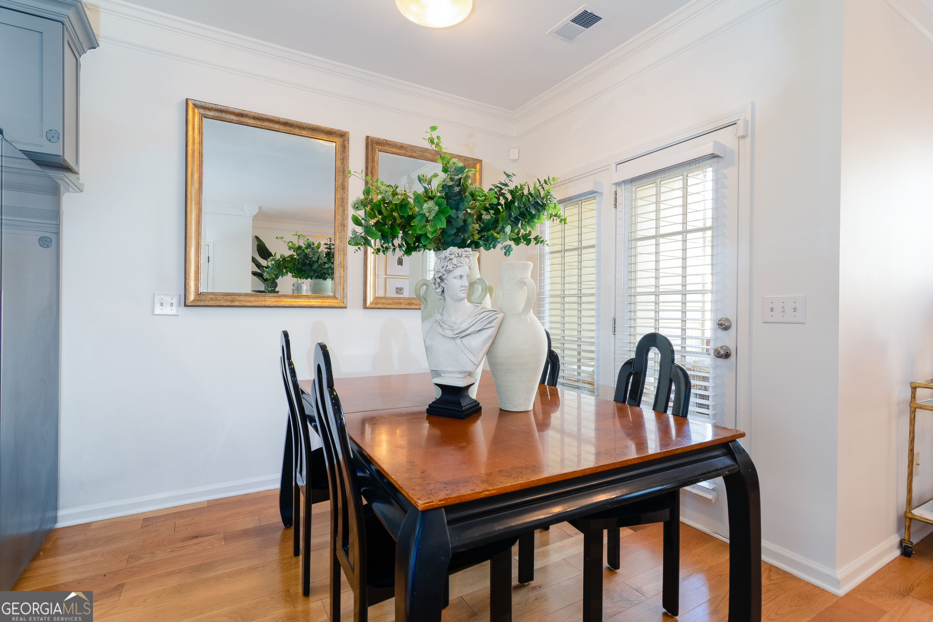 4957 Warmstone Way Southeast, Unit 15 Atlanta, GA 30339 - Photo 10 of 34 a dining room with furniture and window