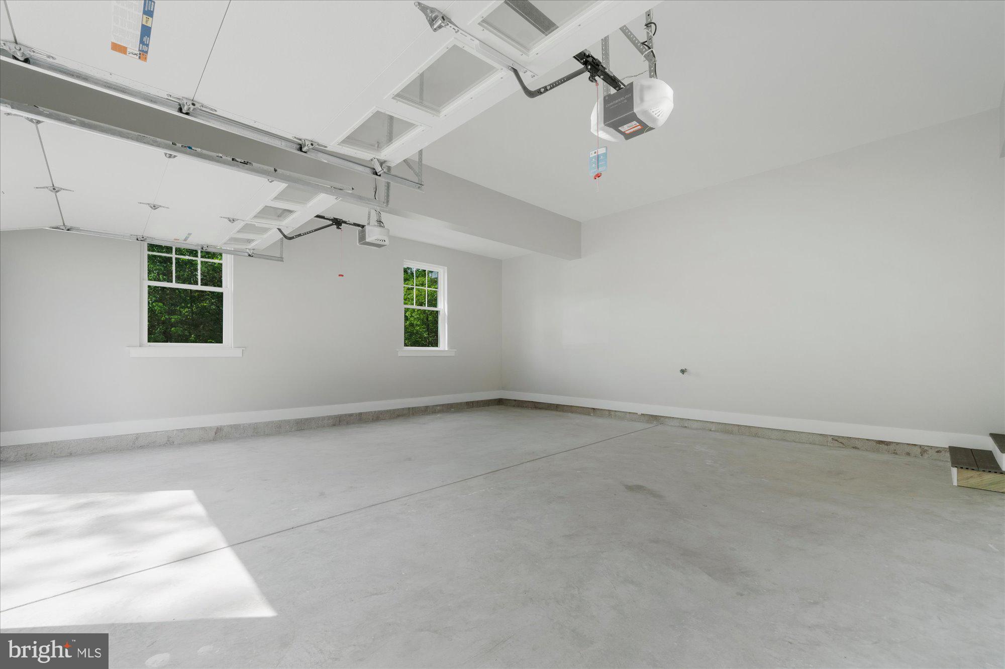 394 Renninger Road Perkiomenville, PA 18074 - Photo 37 of 41 en empty room with windows and ceiling fan