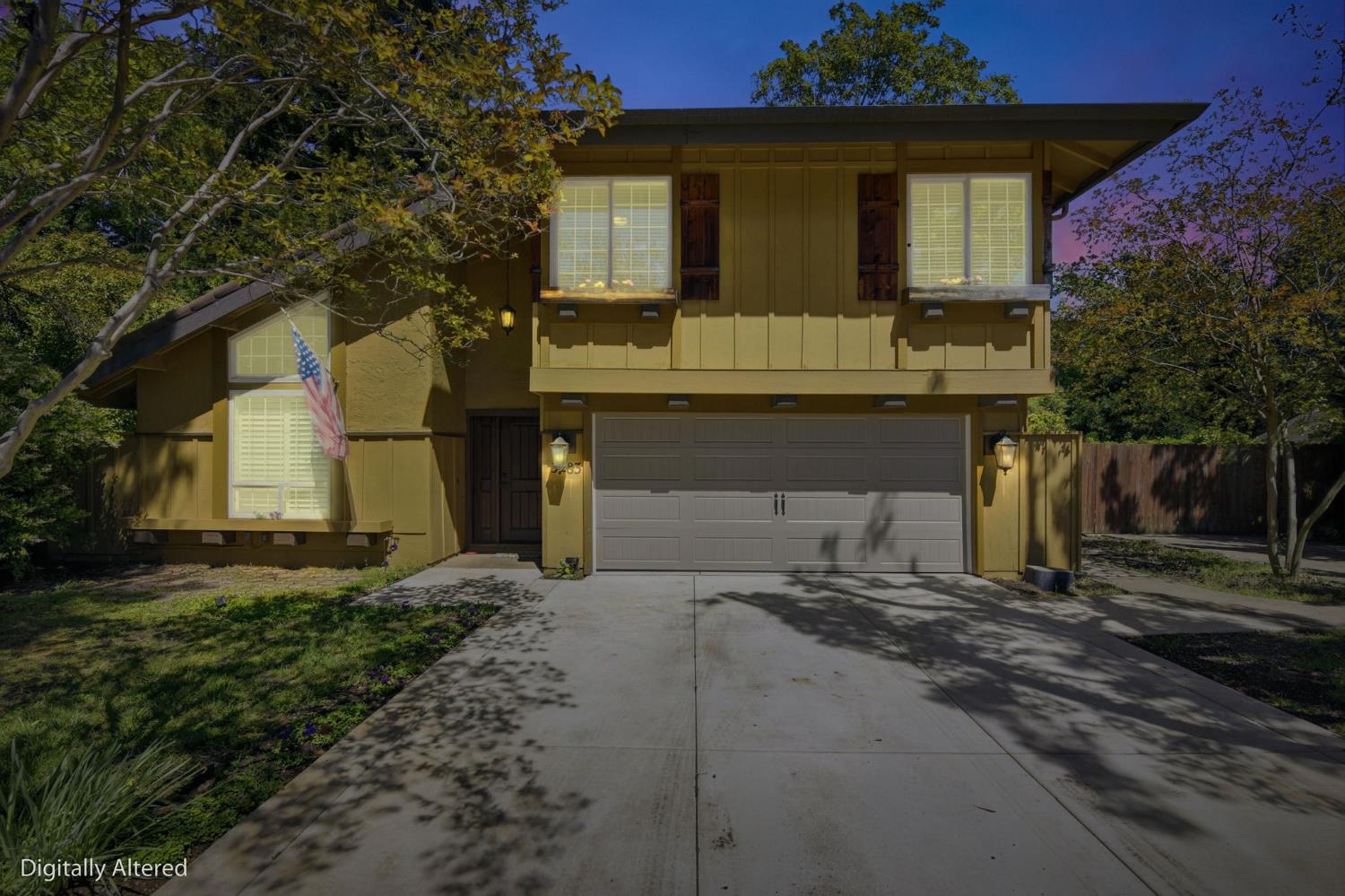 3283 Cambridge Road Cameron Park, CA 95682 - Photo 60 of 61 a front view of a house with a yard