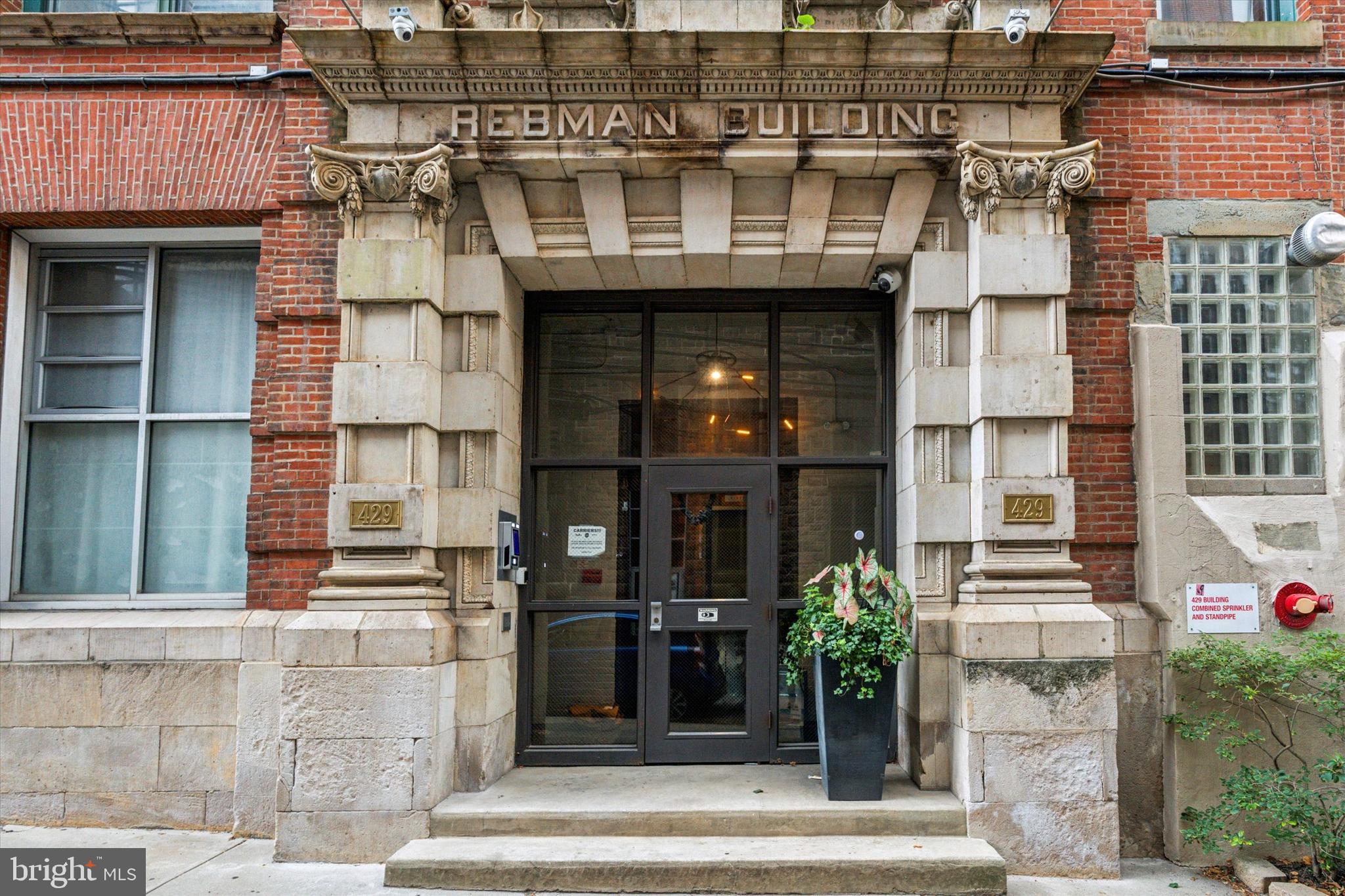 429 North 13th Street, Unit 3E Philadelphia, PA 19123 - Photo 3 of 11 a front view of a multi story residential apartment building
