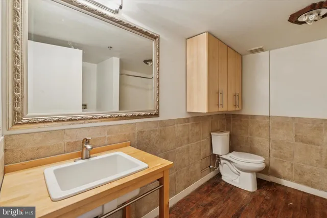 a bathroom with a sink and a toilet