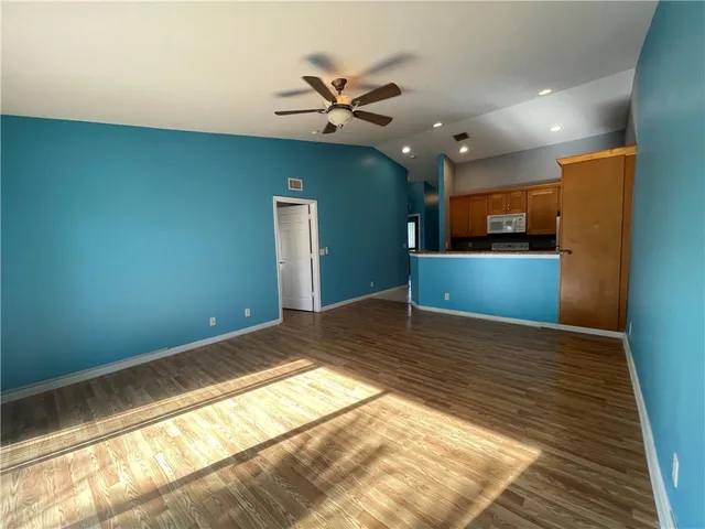 a view of a kitchen with a sink and dishwasher