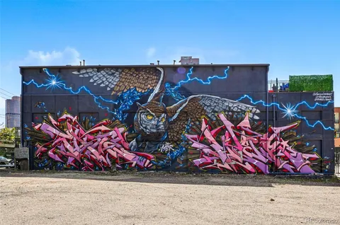 a view of a building with a street