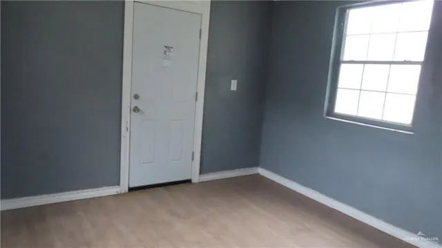 an empty room with windows