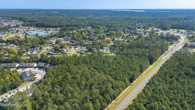 a view of a green landscape from a balcony
