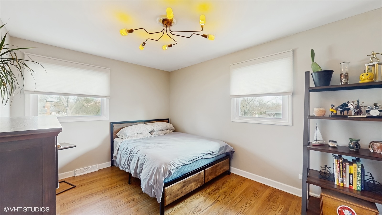 6040 Puffer Road Downers Grove, IL 60516 - Photo 18 of 29 a bedroom with a bed and dresser