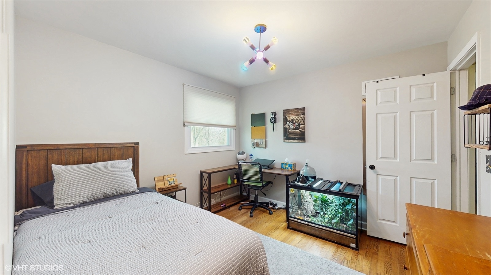 6040 Puffer Road Downers Grove, IL 60516 - Photo 21 of 29 a bedroom with furniture and a window