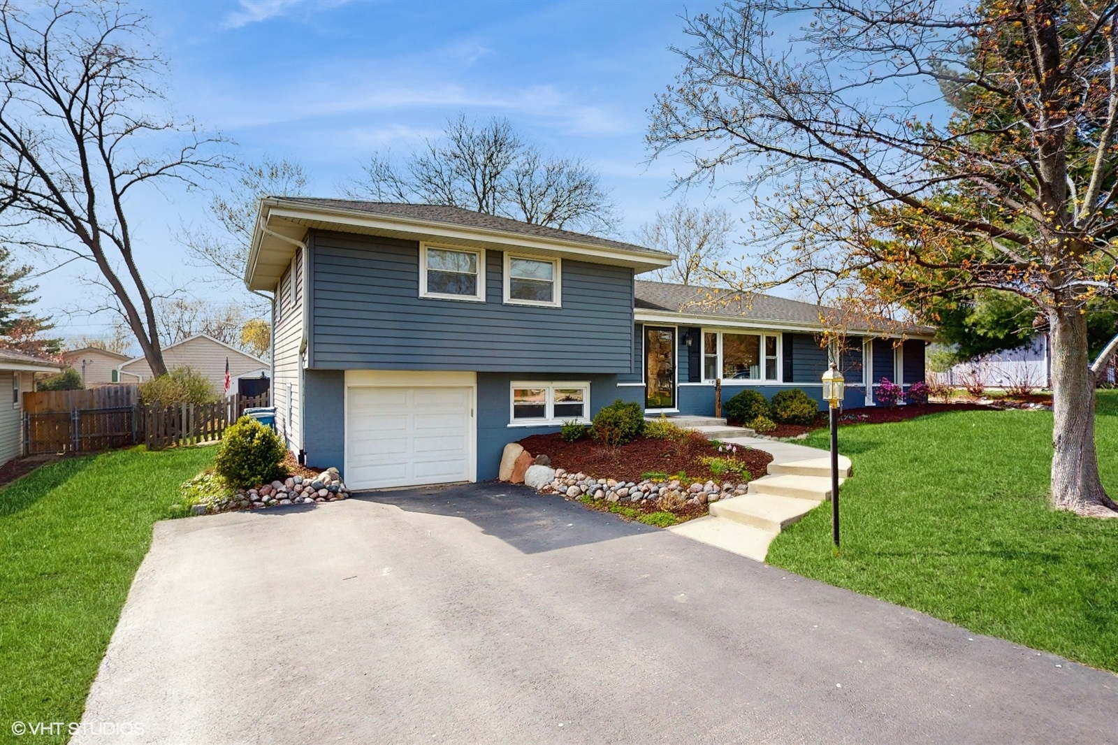 6040 Puffer Road Downers Grove, IL 60516 - Photo 3 of 29 a front view of a house with a yard