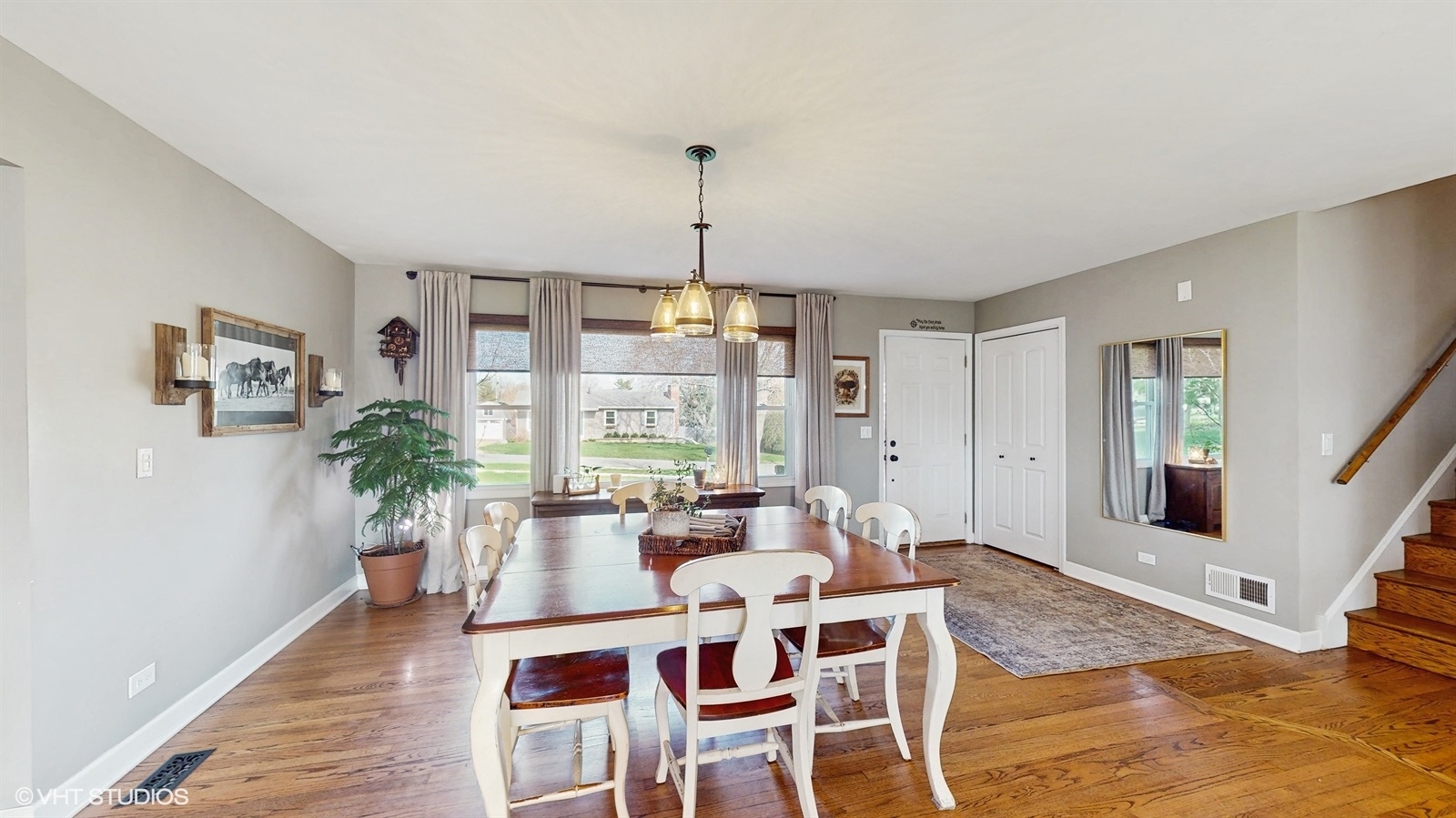 6040 Puffer Road Downers Grove, IL 60516 - Photo 7 of 29 a dining room with furniture window and wooden floor