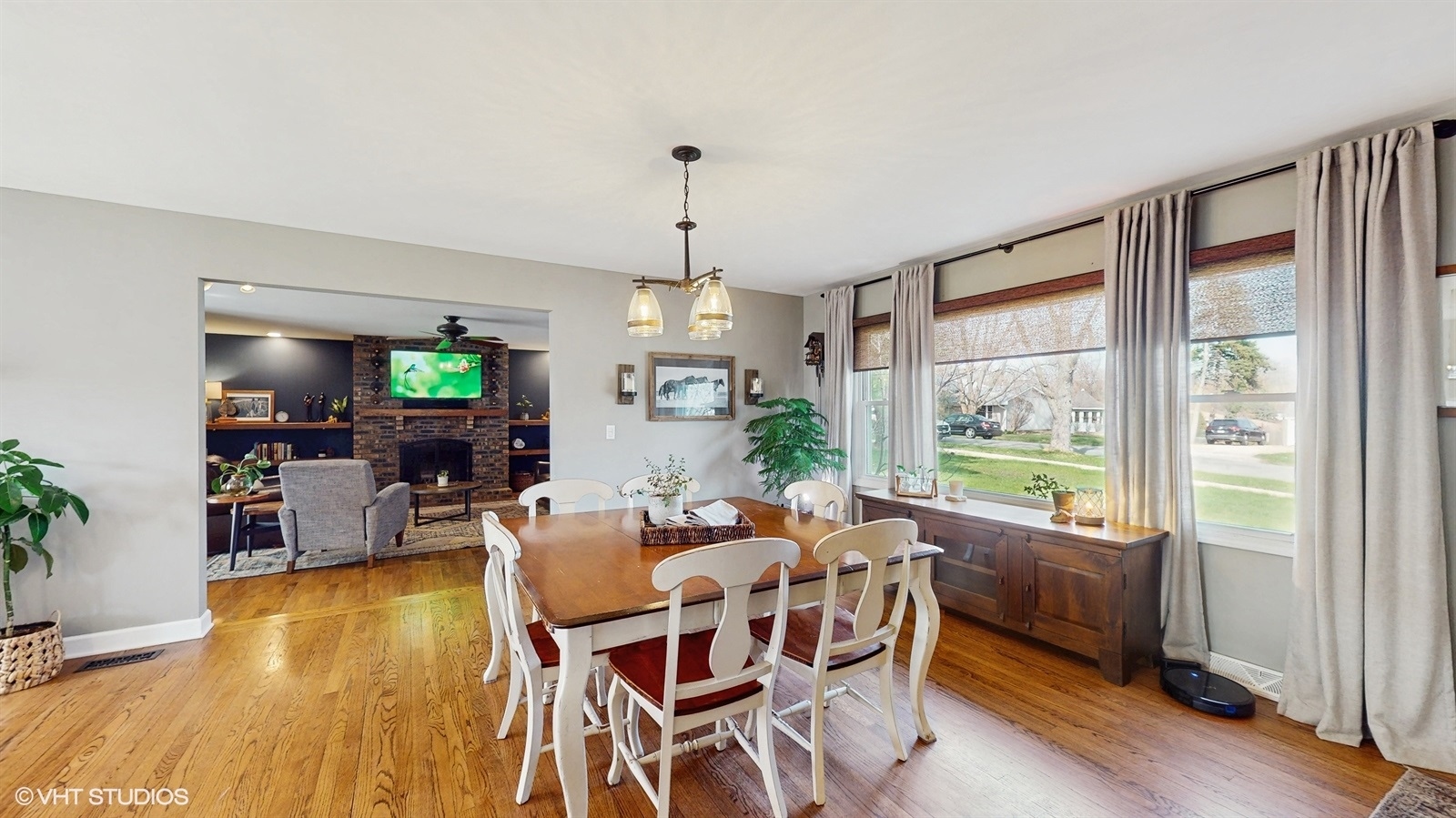 6040 Puffer Road Downers Grove, IL 60516 - Photo 8 of 29 a view of a dining room with furniture window and wooden floor