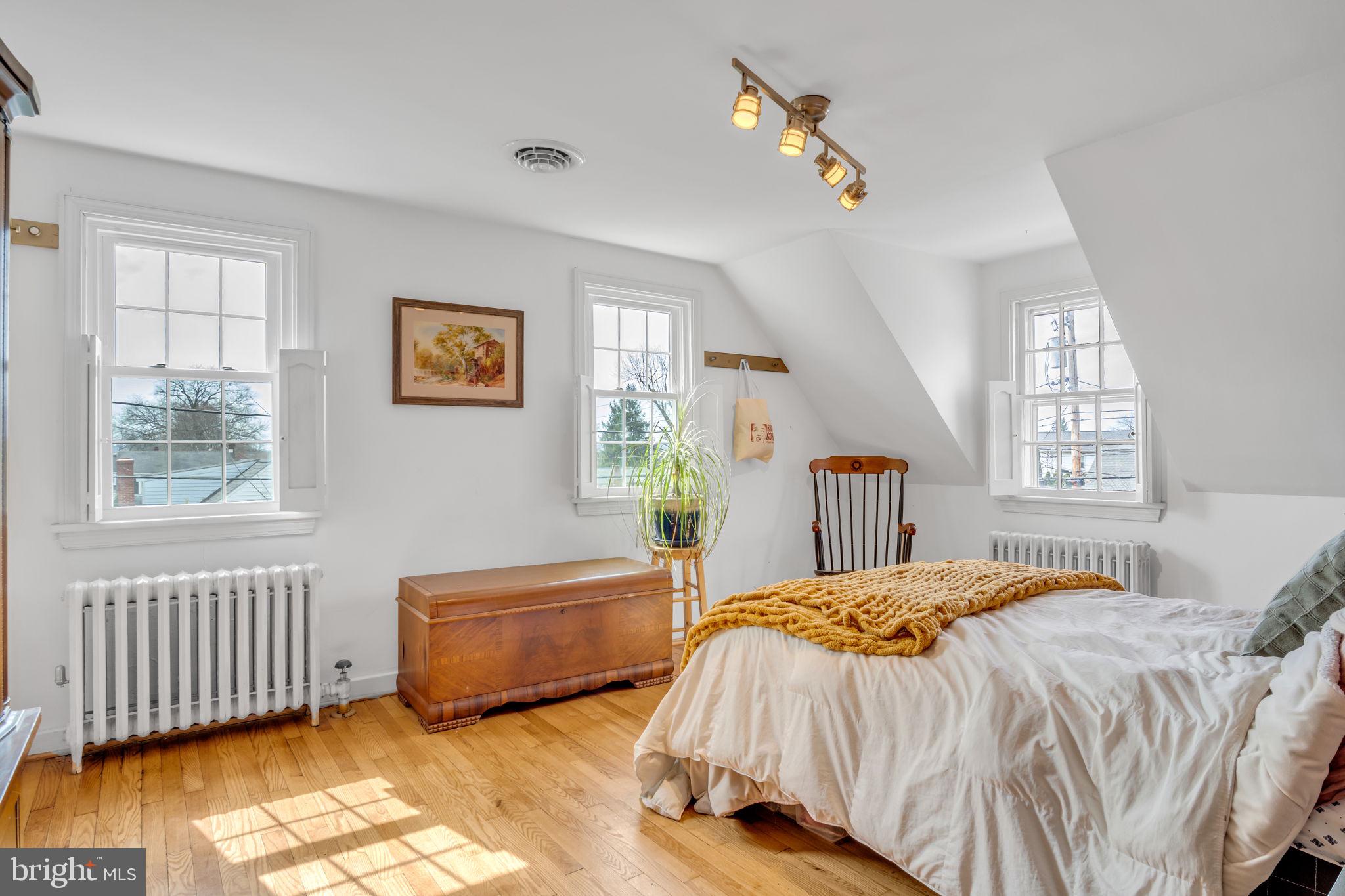 916 North Spring Street Middletown, PA 17057 - Photo 14 of 32 a spacious bedroom with a bed and a window