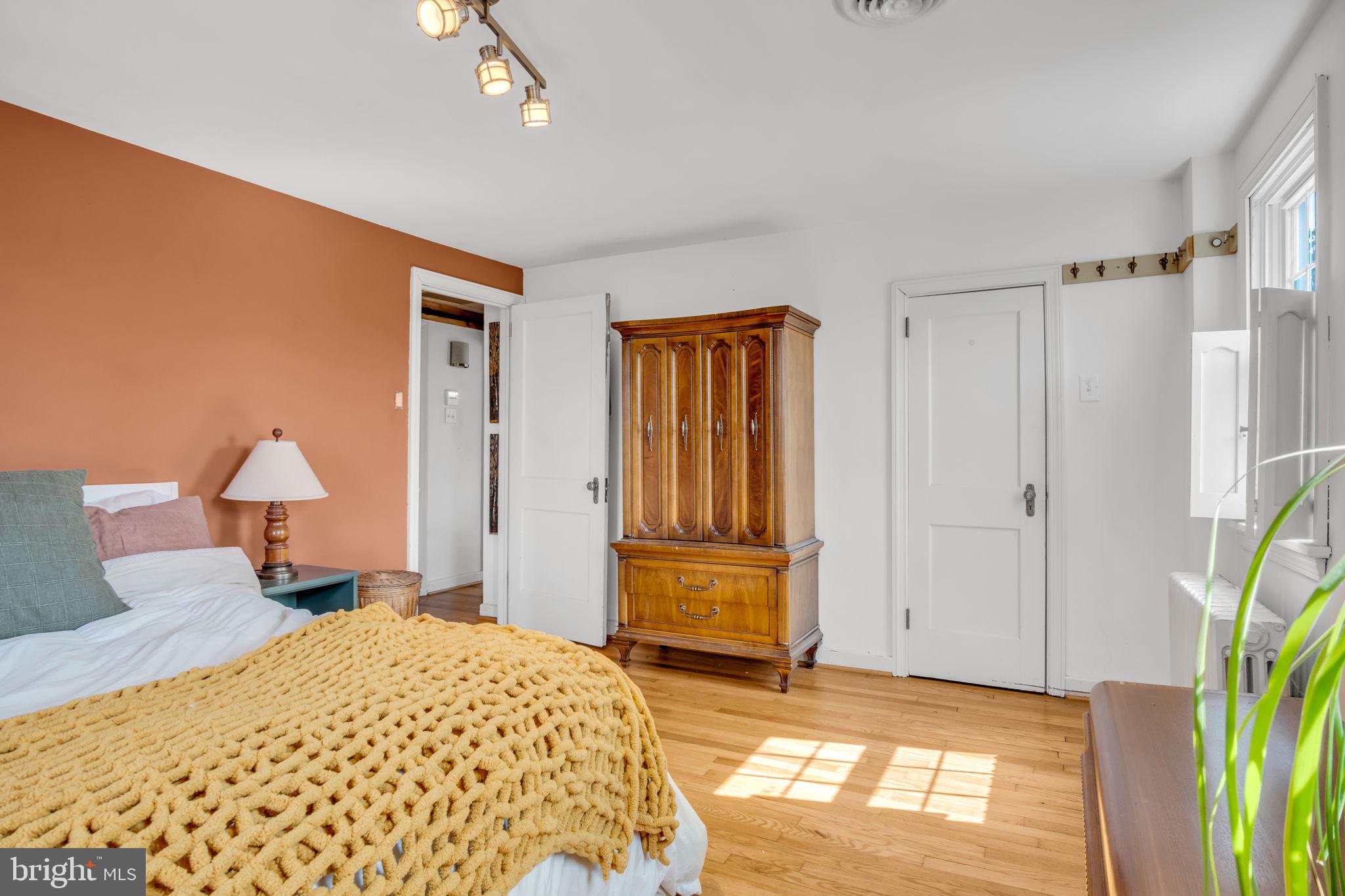 916 North Spring Street Middletown, PA 17057 - Photo 15 of 32 a bedroom with a bed and a couch