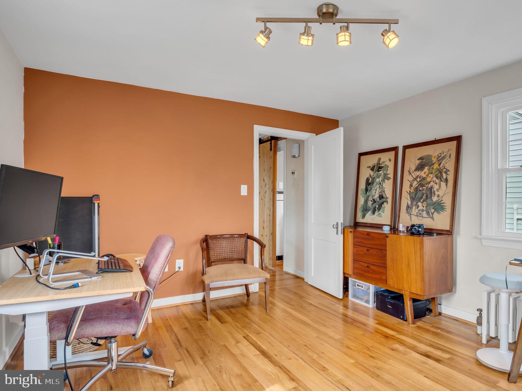 916 North Spring Street Middletown, PA 17057 - Photo 19 of 32 a workspace with furniture and wooden floor
