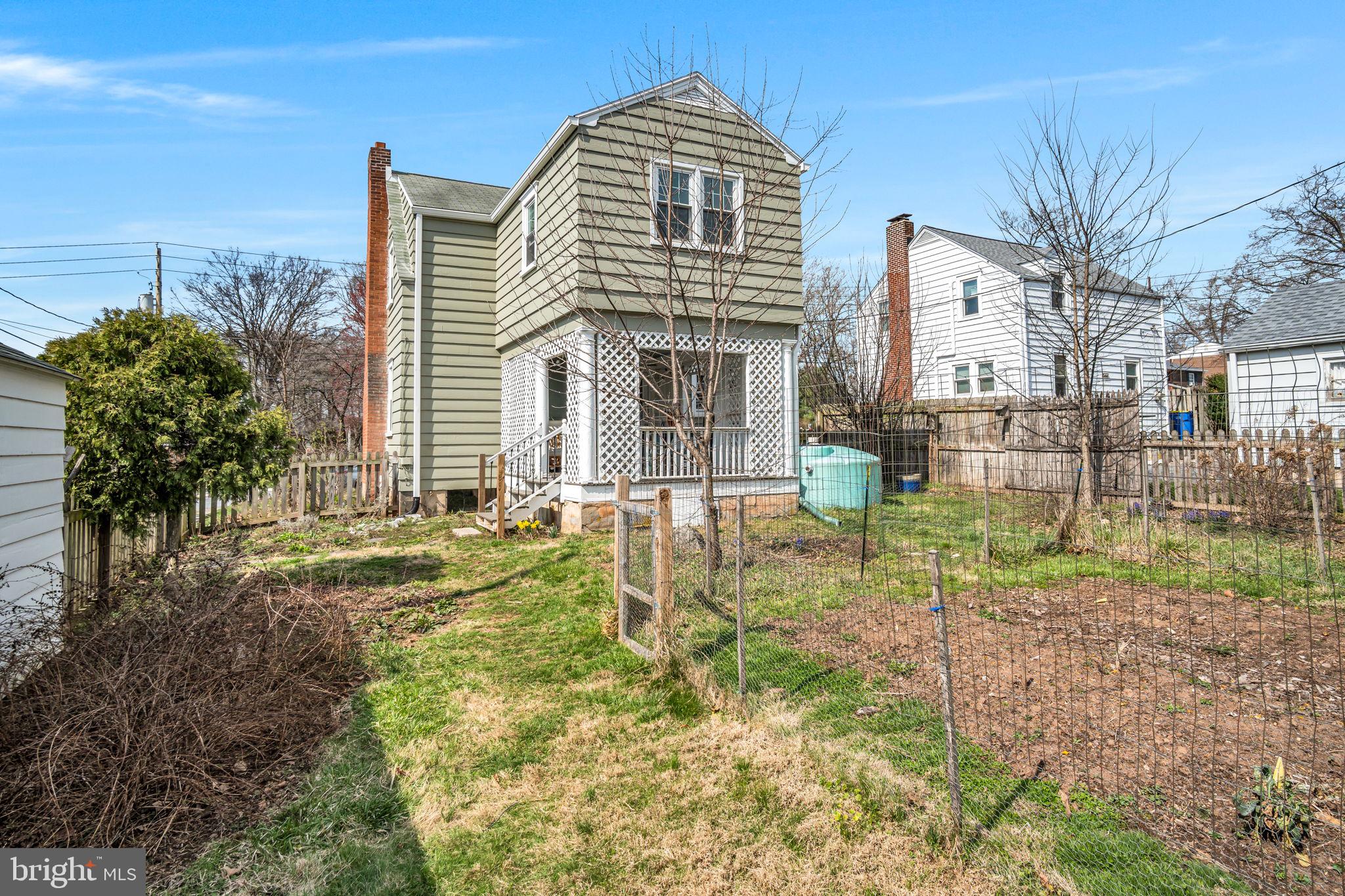 916 North Spring Street Middletown, PA 17057 - Photo 24 of 32 a view of a house with backyard and trees