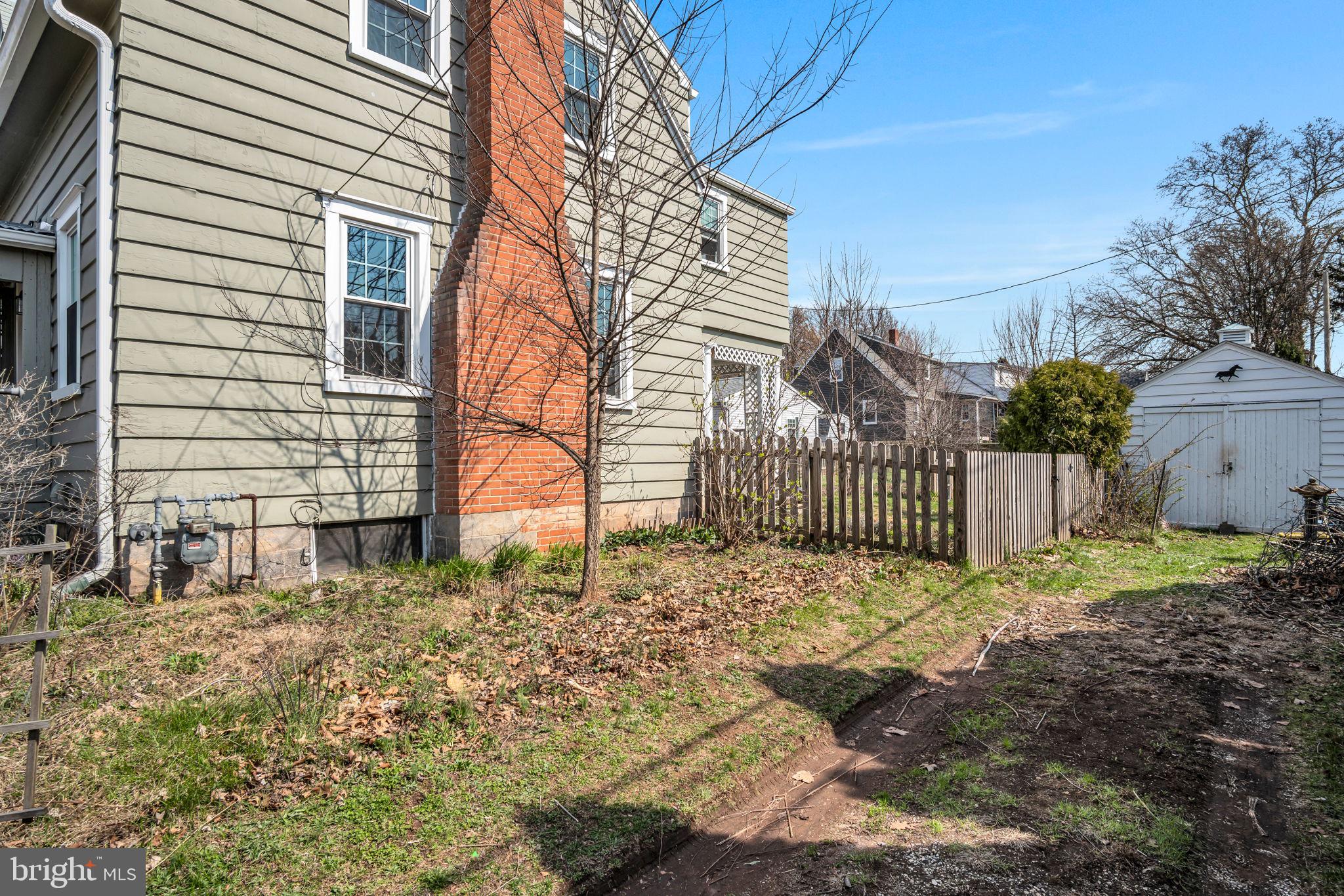 916 North Spring Street Middletown, PA 17057 - Photo 25 of 32 a view of a house with a yard