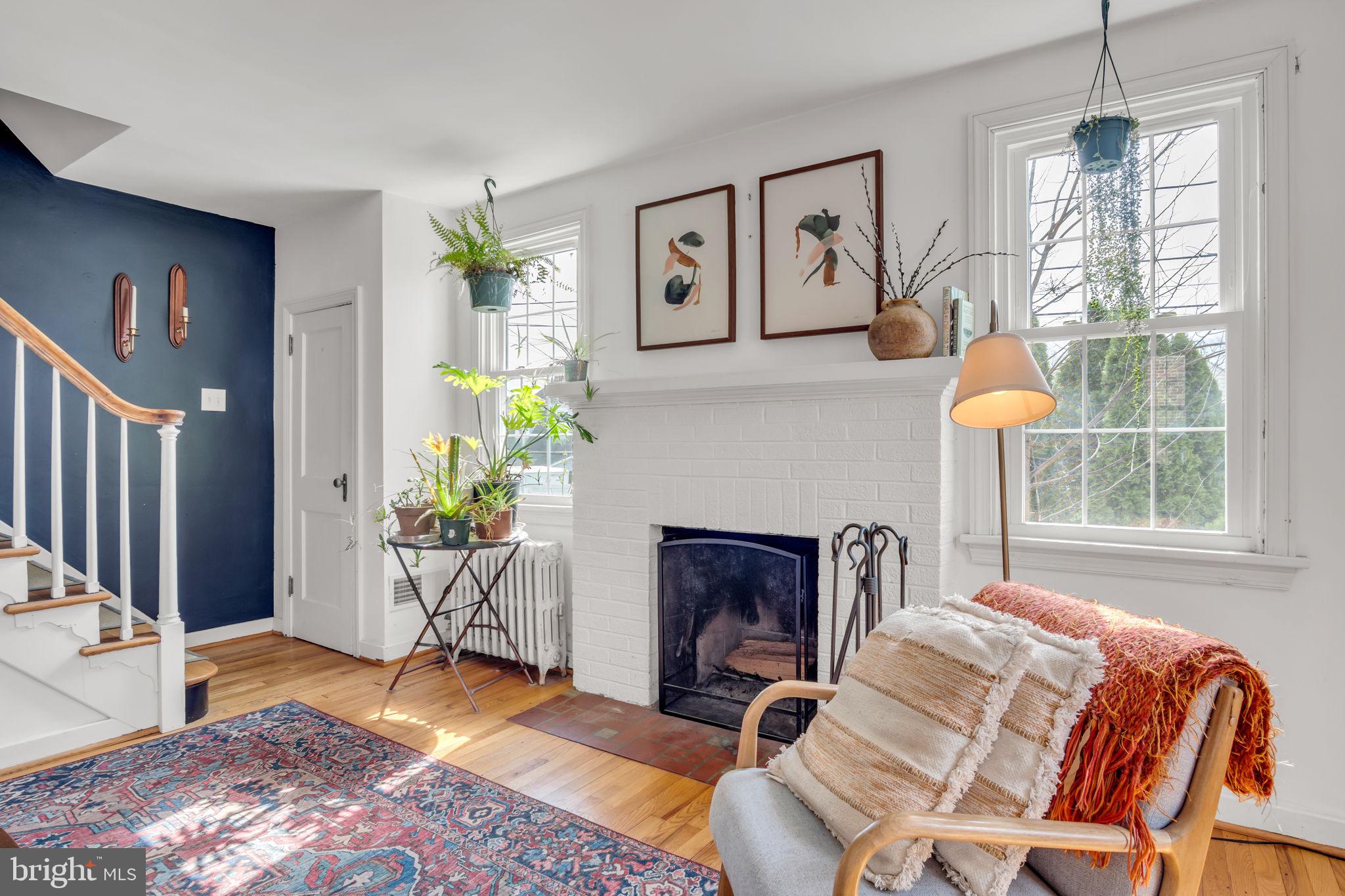 916 North Spring Street Middletown, PA 17057 - Photo 6 of 32 a living room with furniture a window and a fireplace