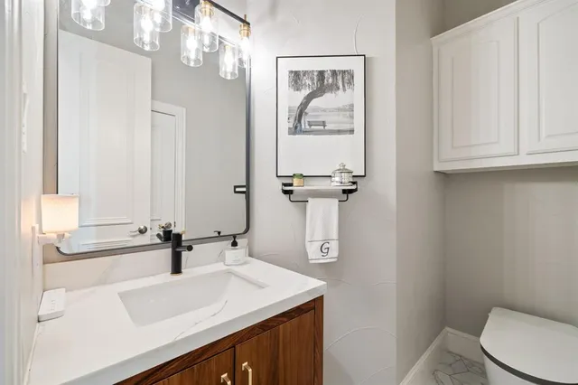 a bathroom with a sink and a toilet