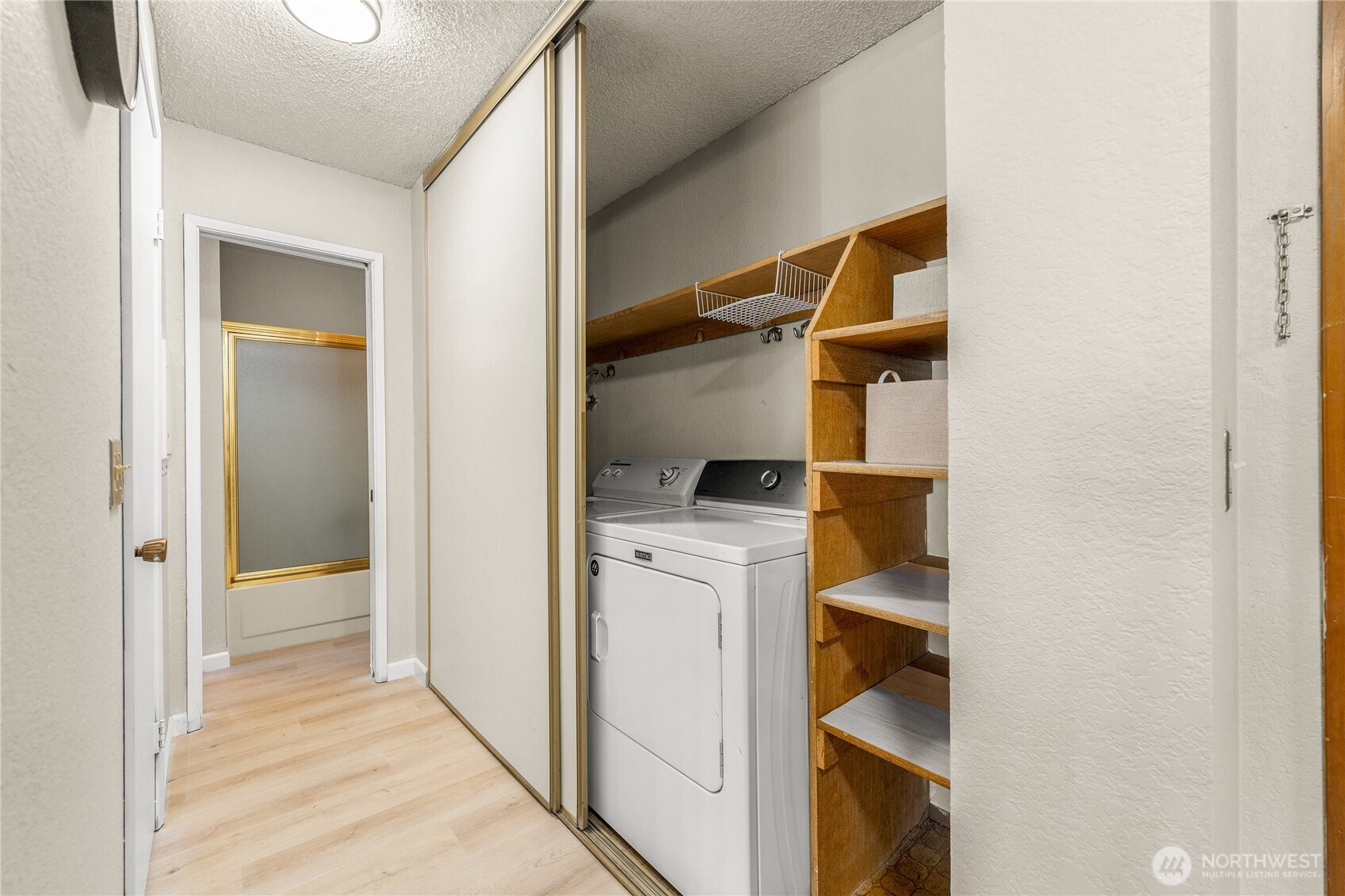 1175 Harrington Place Northeast, Unit 205 Renton, WA 98056 - Photo 17 of 30 a view of walk in closet with white walls