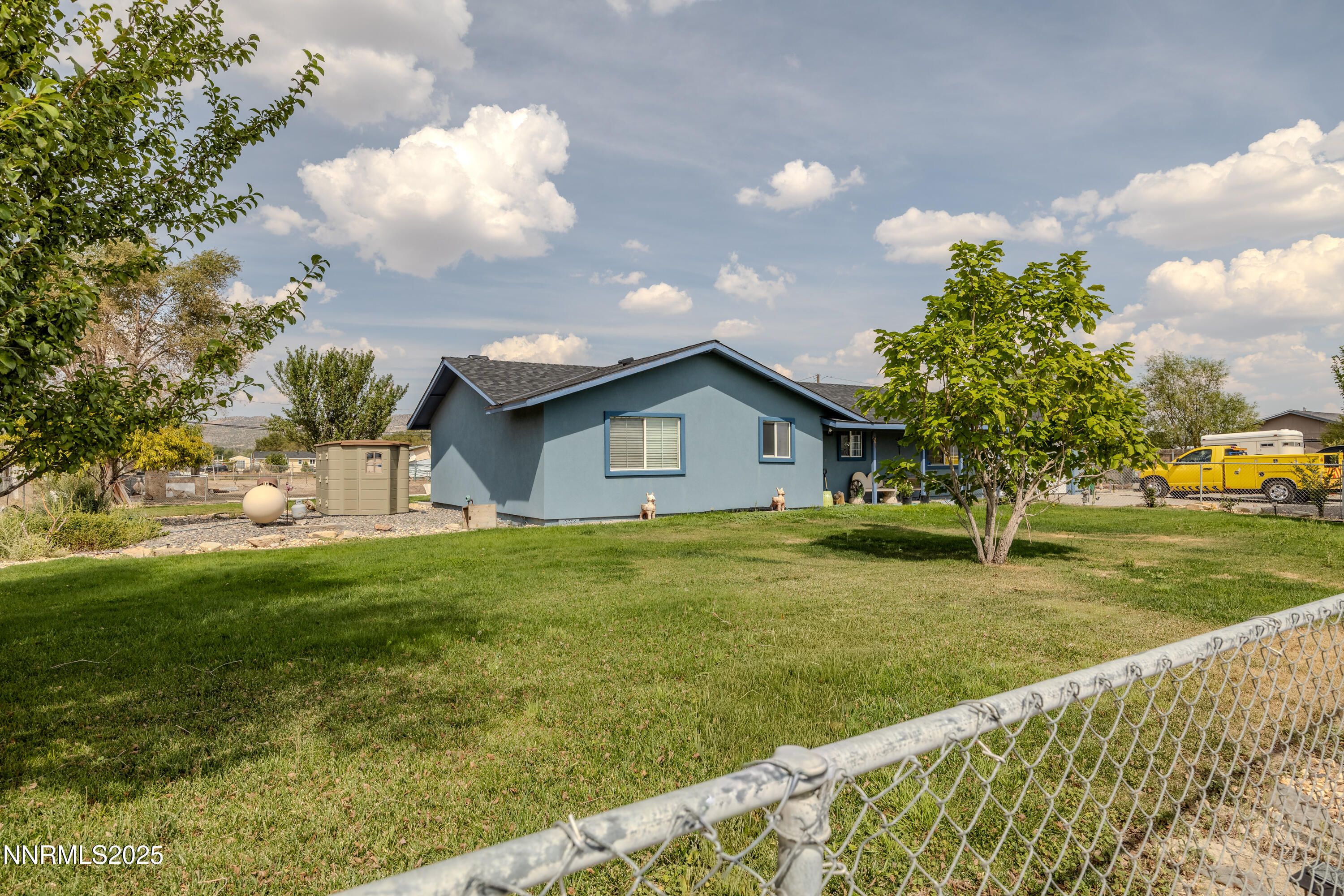 11605 Lemmon Drive Reno, NV 89506 - Photo 18 of 18 a front view of a house with garden