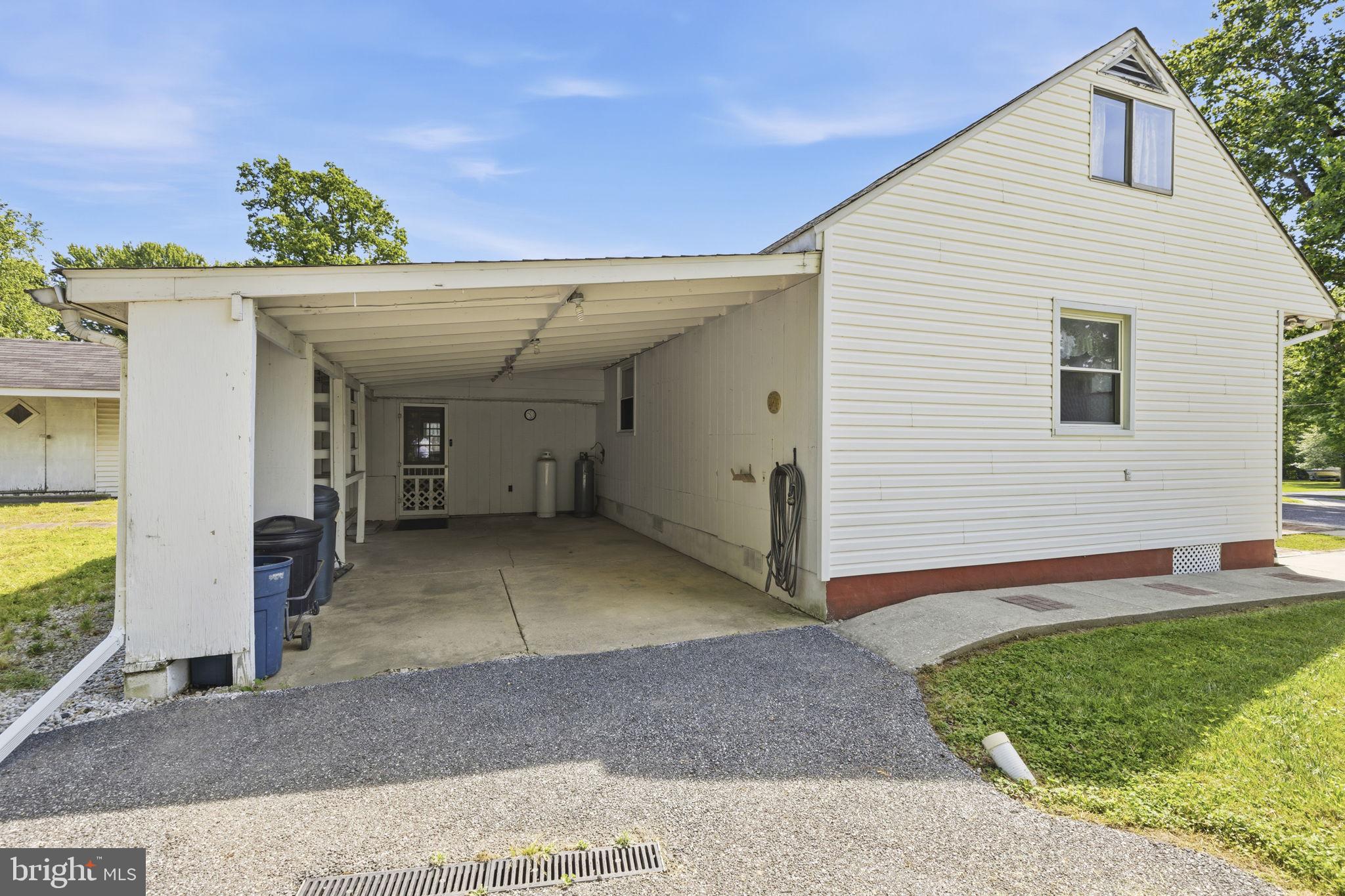 2411 Poplar Road Baltimore, MD 21221 - Photo 27 of 36 a view of a house with a garage