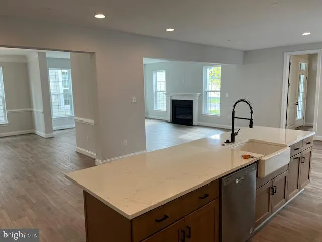 a kitchen with a sink and cabinets