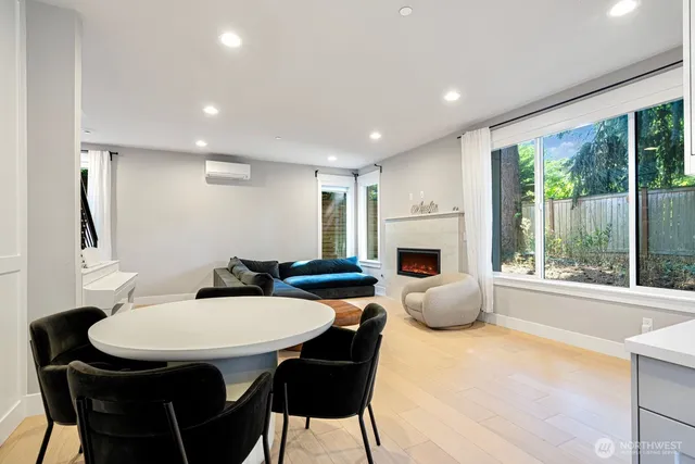 a view of a dining room with furniture window and outside view