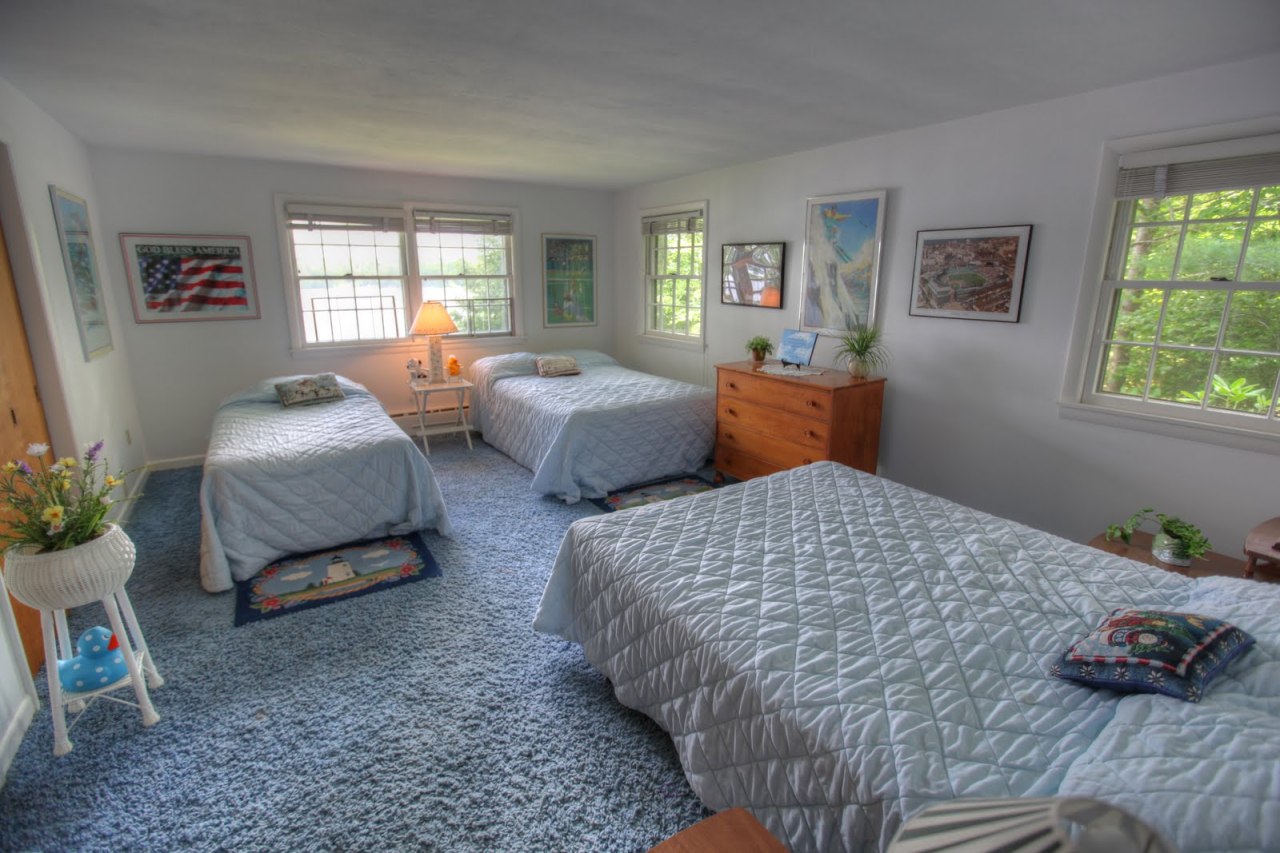 427 Pine Road Otis, MA 01029 - Photo 16 of 30 a bedroom with two beds and a window
